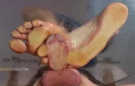 David Trampling Cock On A Glass Table